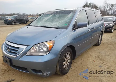 2010 Honda Odyssey Ex-L z USA, uszkodzony, nr VIN 5FNRL3H7XAB082999